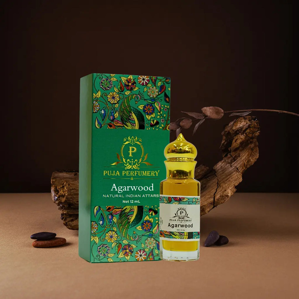 Puja Perfumery Agarwood perfume bottle and packaging on a brown background