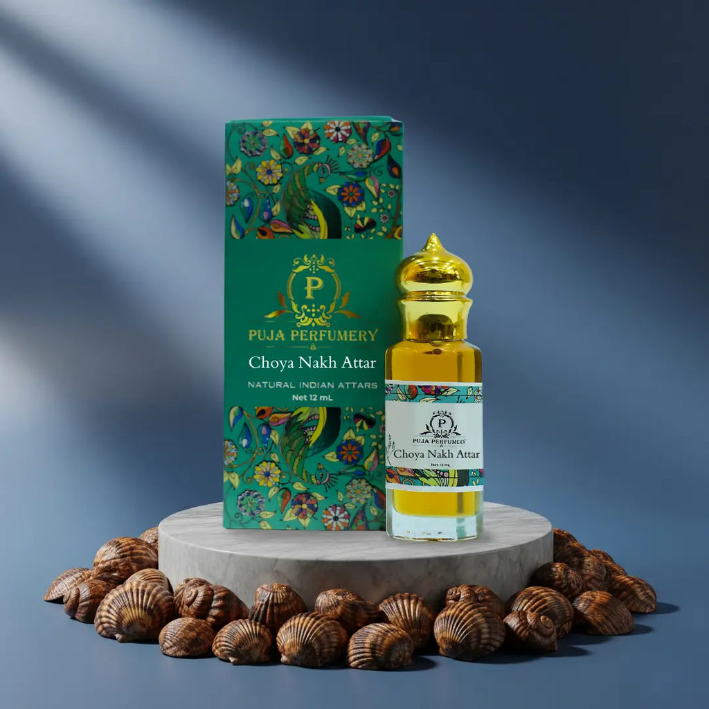 Puja Perfumery Choya Nakh Attar bottle and packaging on a blue background