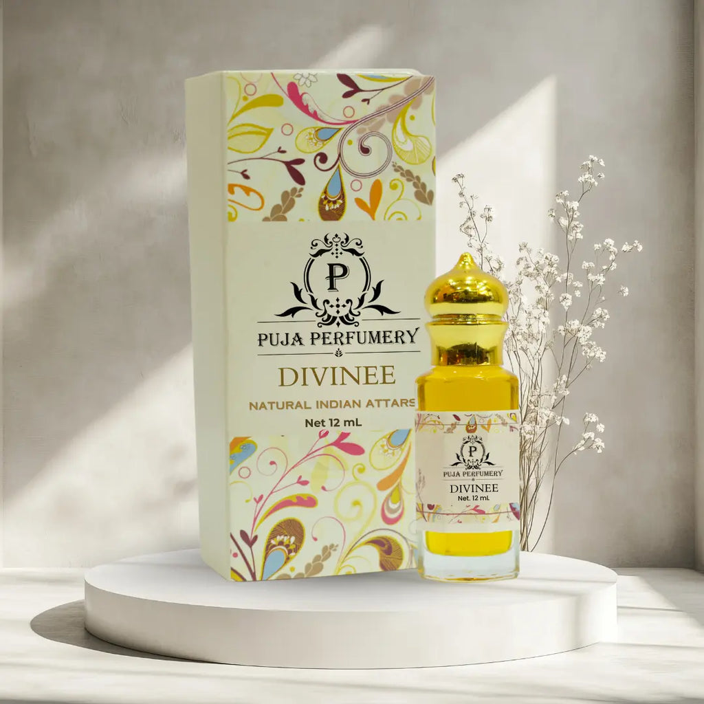 Puja Perfumery Divinee perfume bottle and packaging on a neutral background