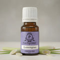 Bottle of Puja Perfumery Lemongrass essential oil with a white background