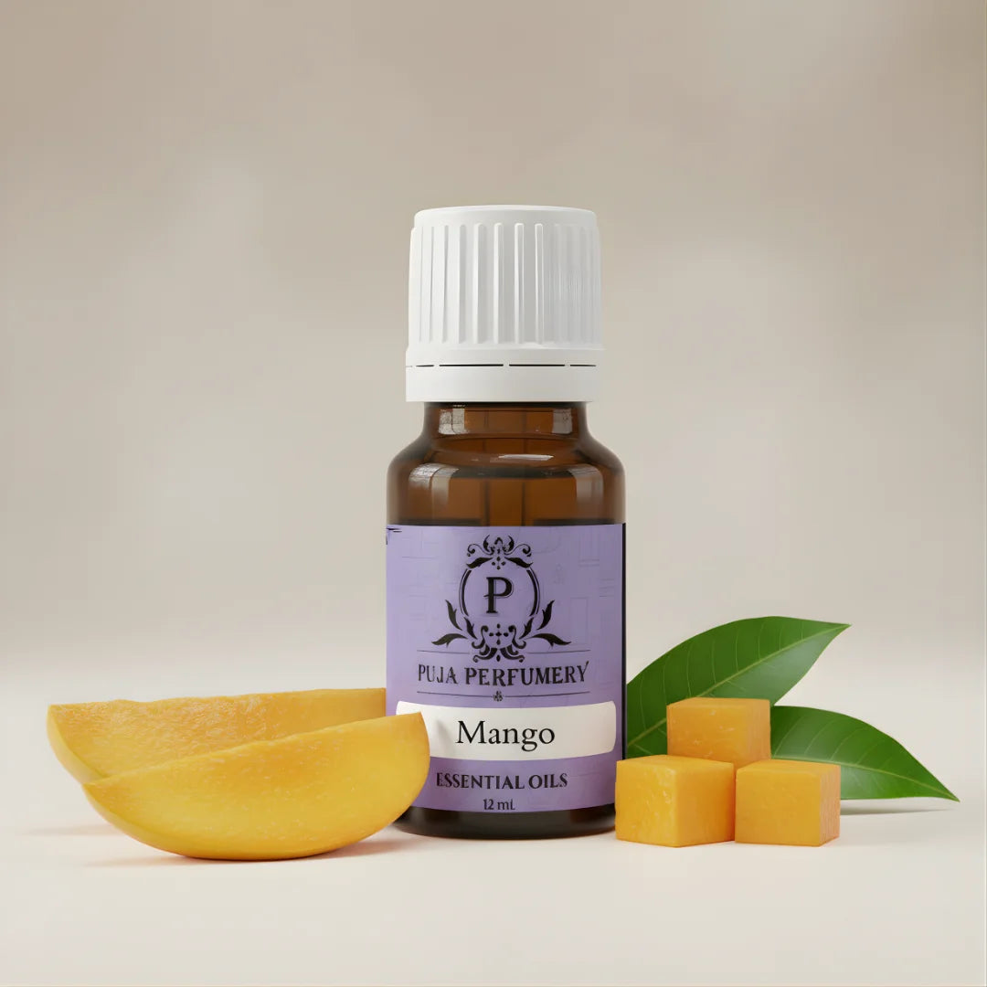 Bottle of Pua Perumery Mango essential oil with mango slices and leaves on a beige background