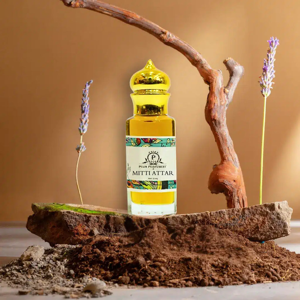 Bottle of Mith Attar on a wooden platform with lavender flowers