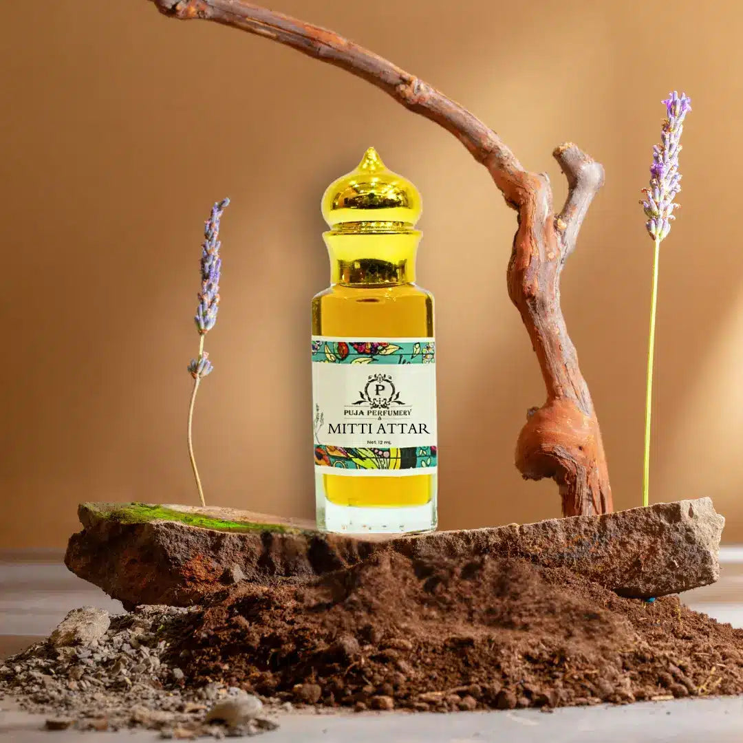 Bottle of Mith Attar on a wooden platform with lavender flowers