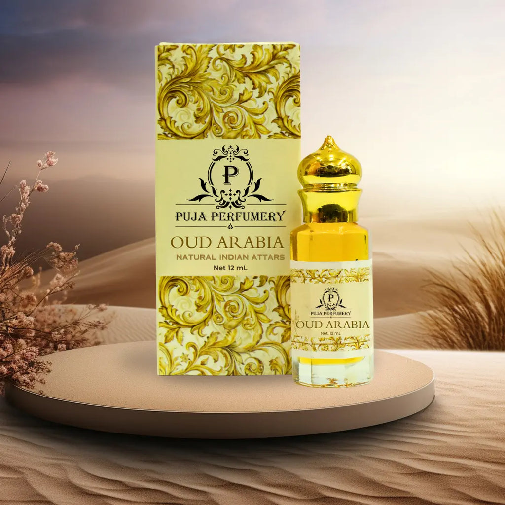 Puja Perfumery Oud Arabia Attar with packaging on a desert background