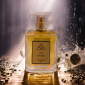 Perfume bottle labeled 'Oud Cassino' with water splashes and a dark background