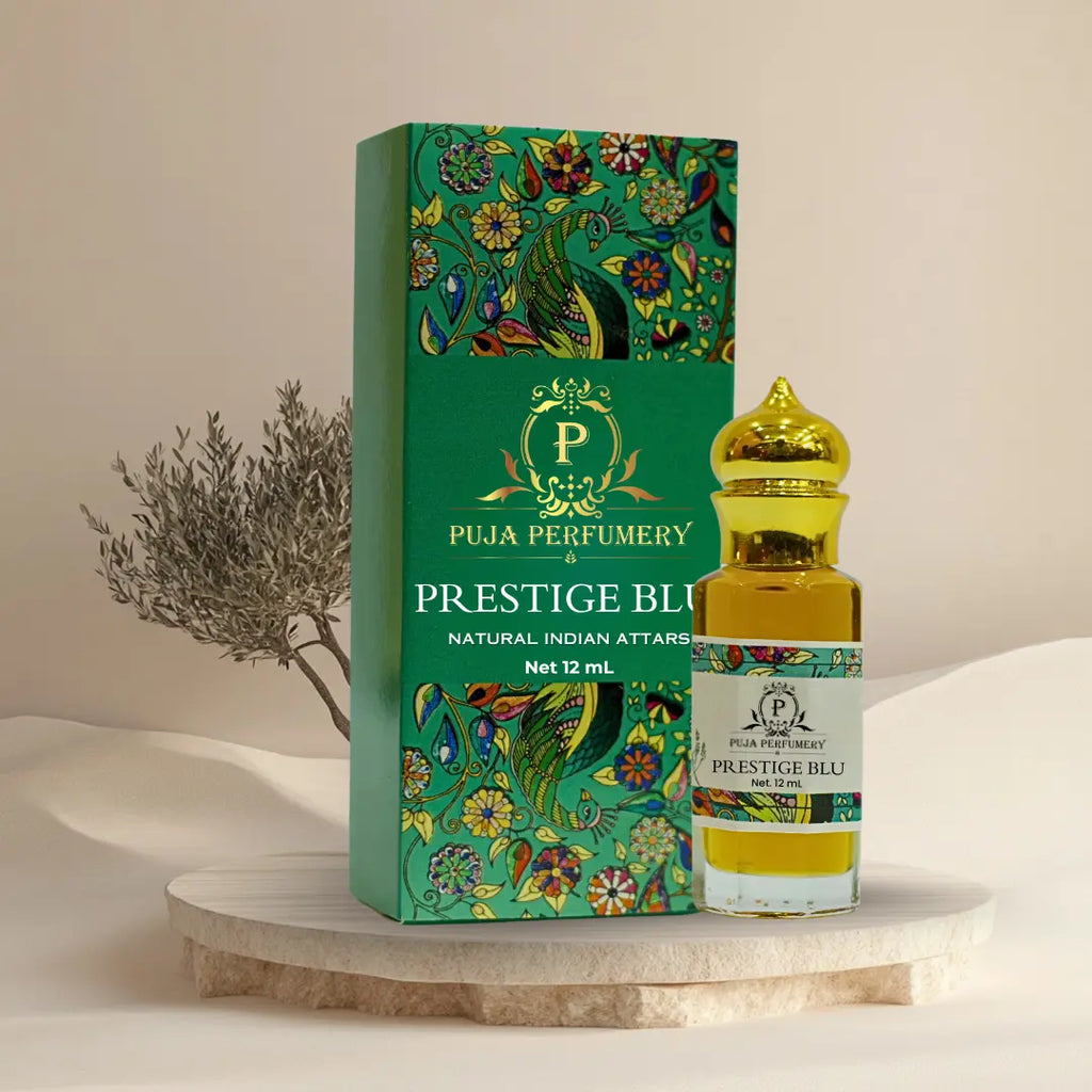 Puja Perfumery Prestige Blu perfume bottle and packaging on a neutral background