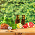 Tropical Paradise Attar Combo with fruits and herbs on a wooden surface