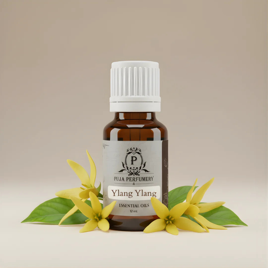 Ylang Ylang essential oil bottle with flowers on a beige background