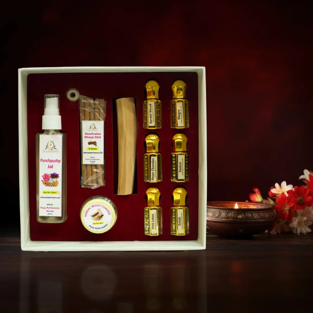 devlok-kit-Set of traditional Indian products including oils and a stick in a decorative box with a dark background.